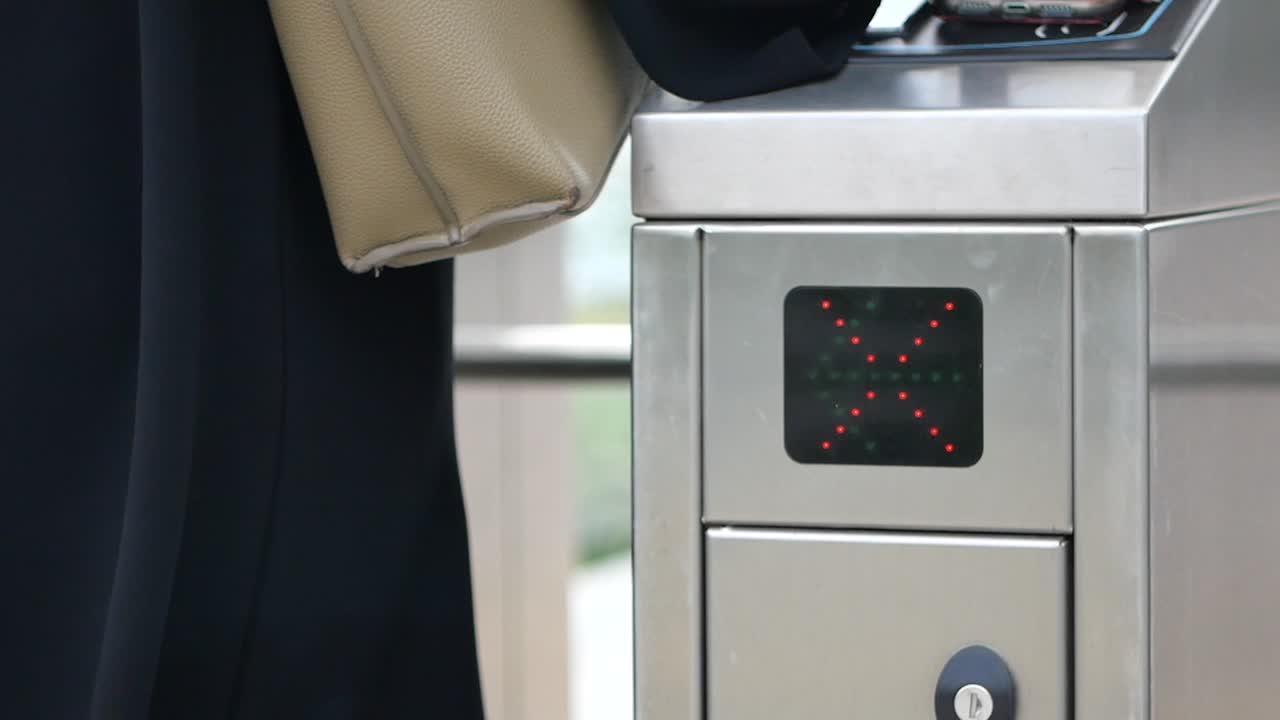 A turnstile controlling access in a public transportation setting