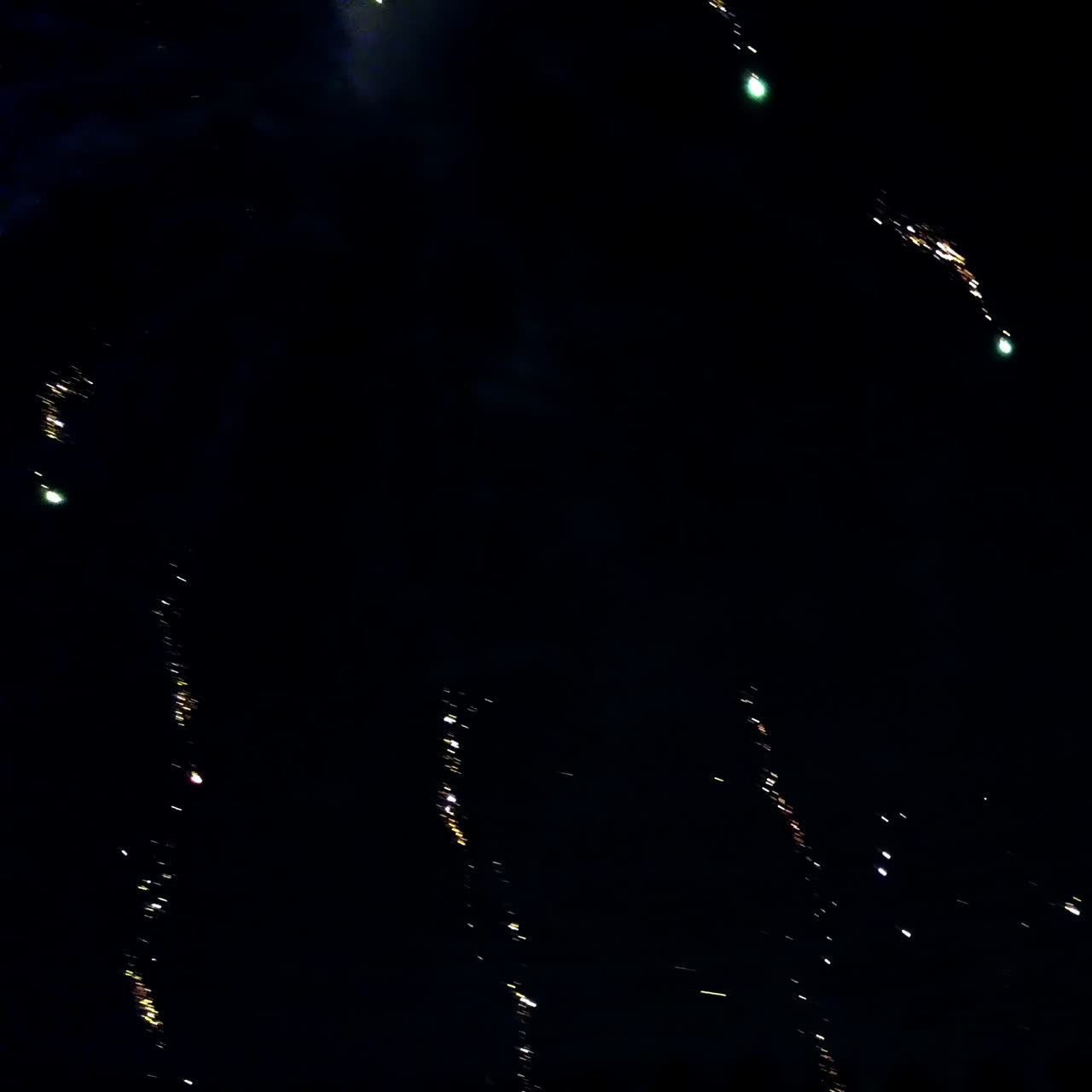 Firework display. Colorful Firework lights streaks in the night sky. Happy New Year