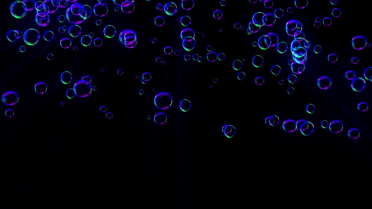Rainbow bubbles on a dark background