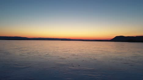 frozen river sunrise/sunset landscape