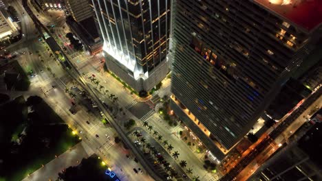 a stunning night panorama of miami, featuring landmark buildings and the rhythmic flow of traffic