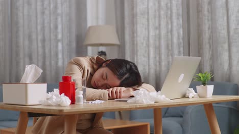 tired woman sleeping at her desk