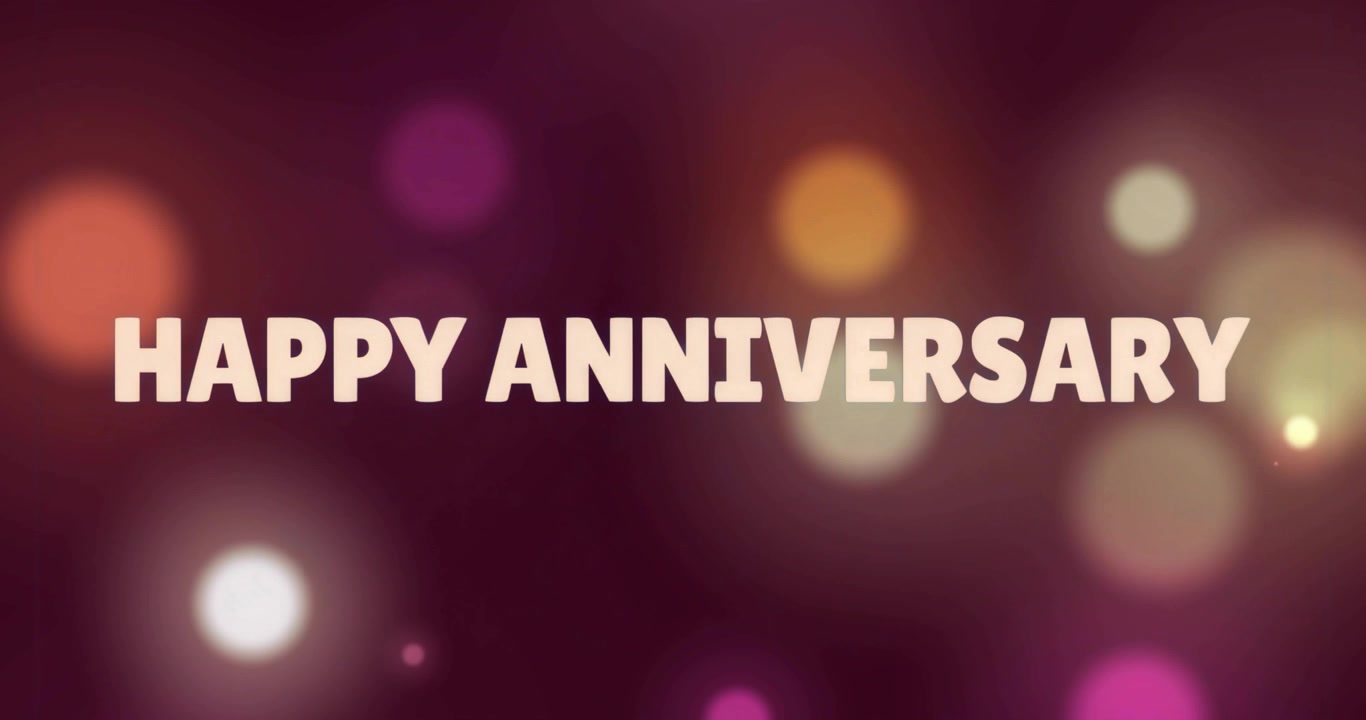 Startup HAPPY ANNIVERSARY text fading in as warm bokeh lights shifting for festive vibe
