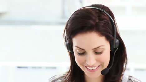 Smiling-woman-working-in-a-call-center
