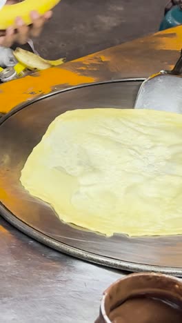 making roti on a hot plate