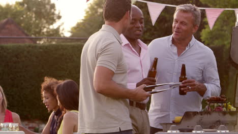 mature friends enjoying outdoor barbeque shot on r3d