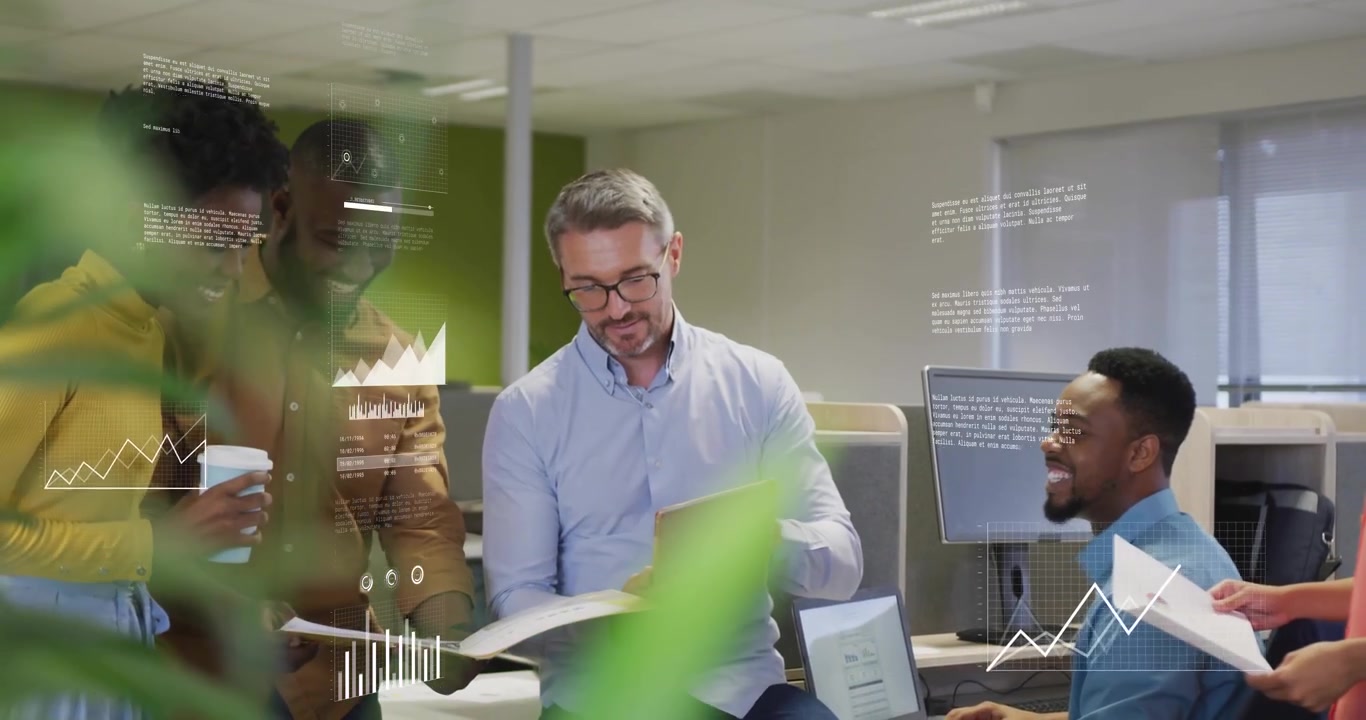 Man scrolling tablet and revealing graphs while team pointing charts and analyzing business trends