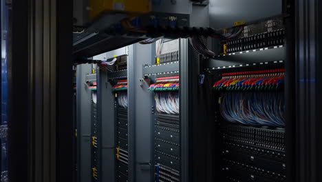 data center server racks with colorful network cables
