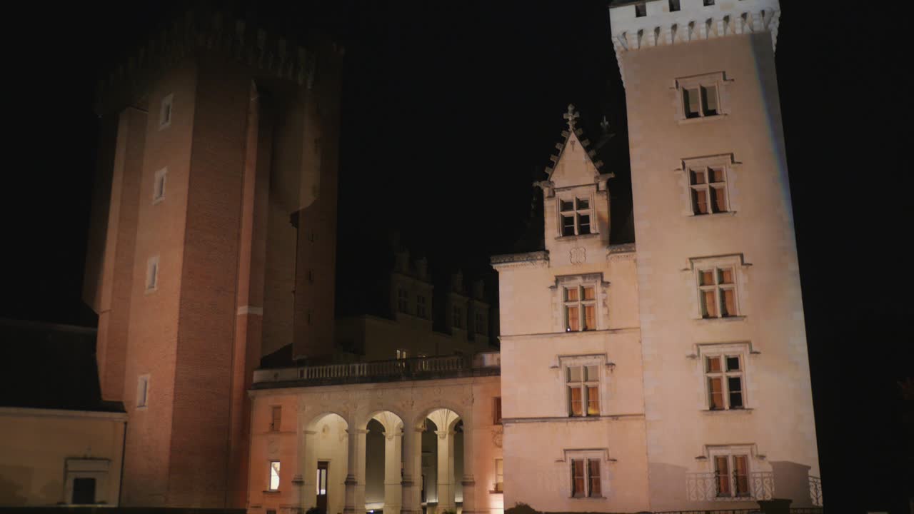 Pau Castle in France shown at night with historic architecture, illuminated facade and cultural significance