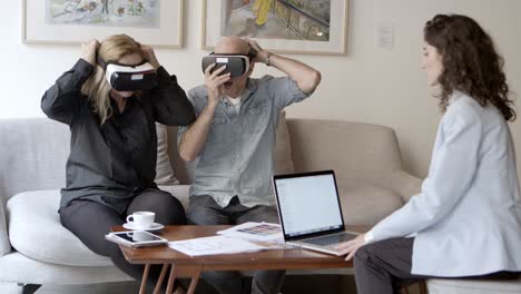 surprised mature people experiencing vr glasses