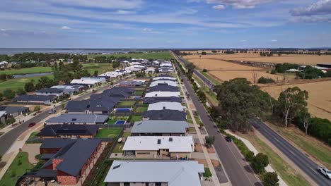 Aerial-showing-on-one-side-of-the-Midland-Highway-there-are-new-houses-and-on-the-other-side-are-farm-fields