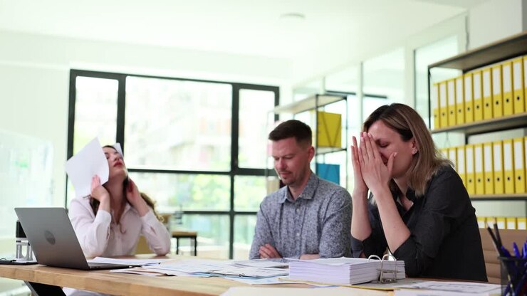 Stressed business people in the office