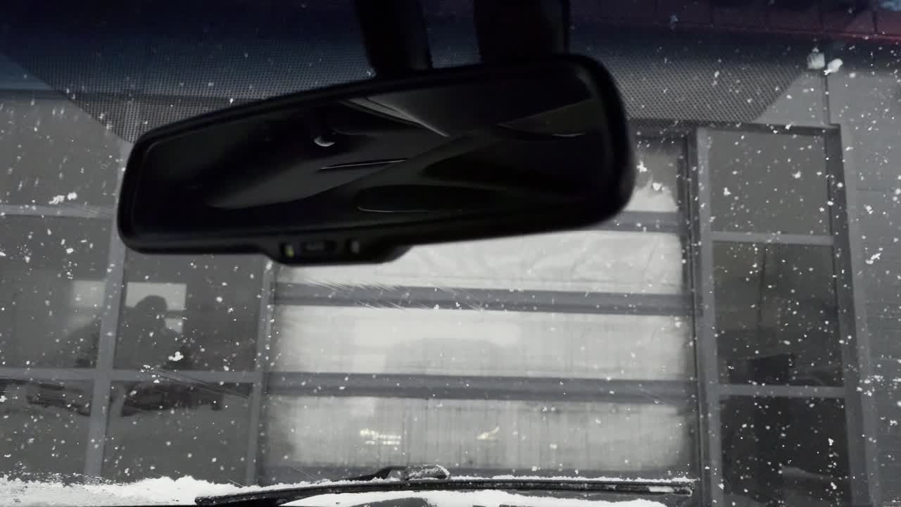 Snowy Windshield View from Inside a Car