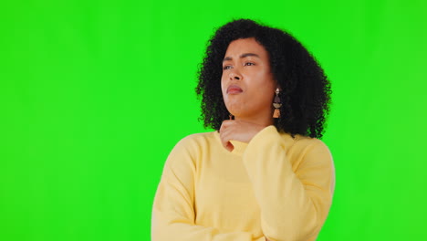 Thinking, woman and confused face on studio green
