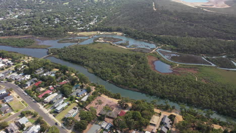 Aerial rotates over lush, natural Coogoorah Res in Anglesea Australia
