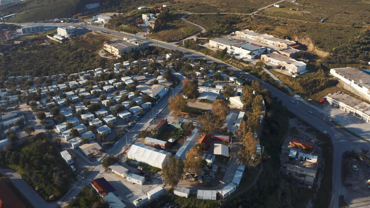 Aerial View Of Beautiful and Unique Houses Surrounded By Green Trees During Sunny Day - Aerial Shot