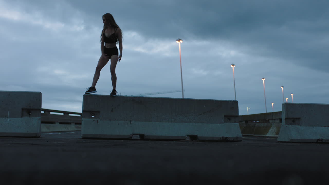 dancing woman beautiful young caucasian street dancer performing contemporary moves enjoying modern dance expression practicing in cloudy city