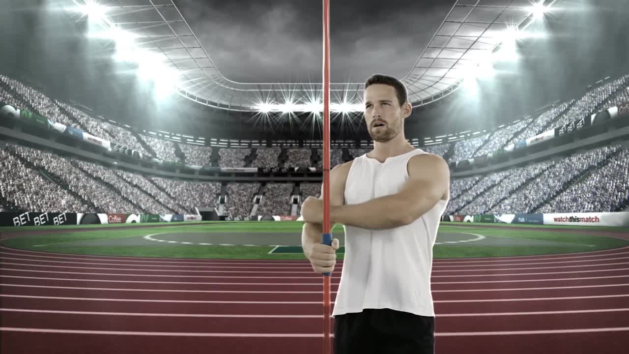 Male athlete warming up before javelin throw