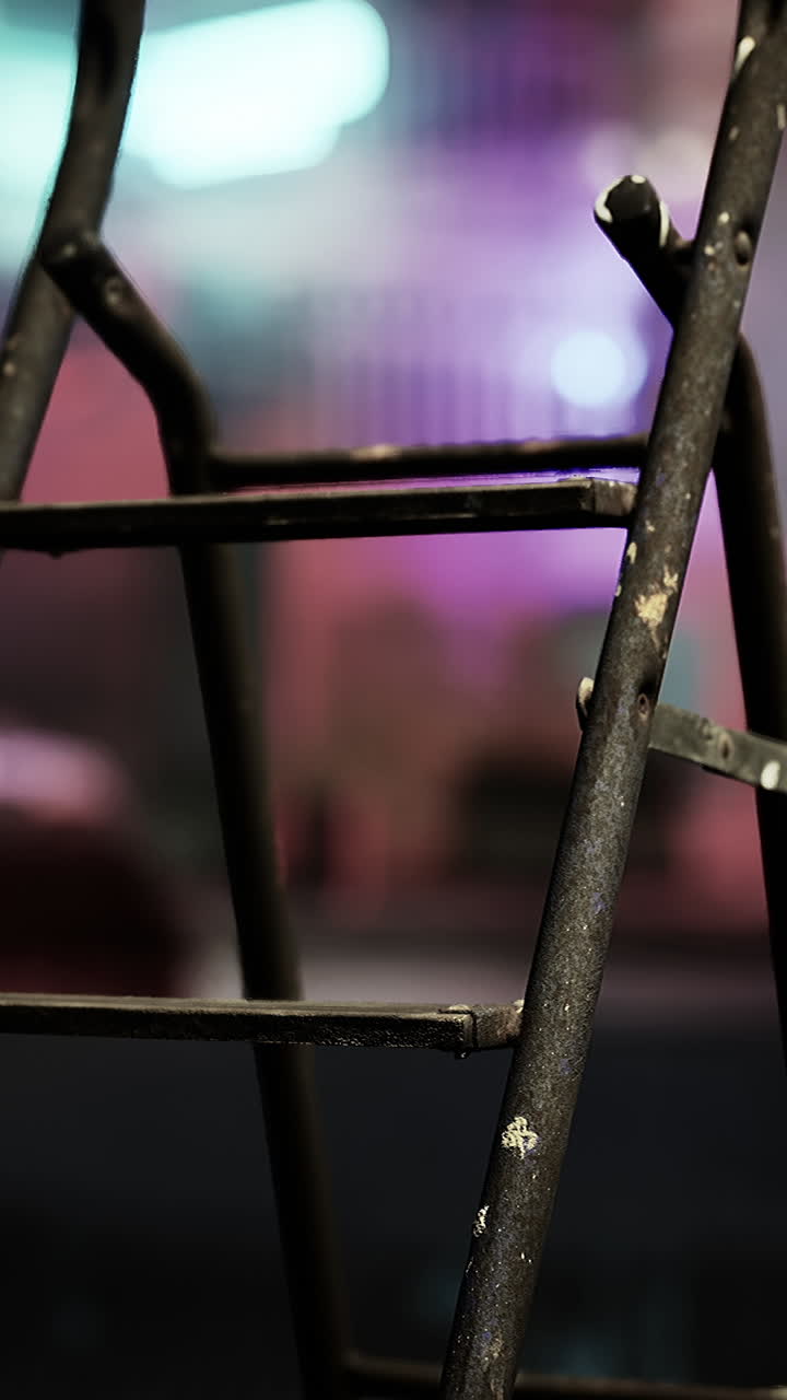A wooden ladder sitting on top of a sidewalk