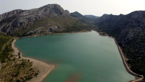 Artificial-water-reservoir-Mirador-des-Gorg-Blau-in-Mallorca-mountains