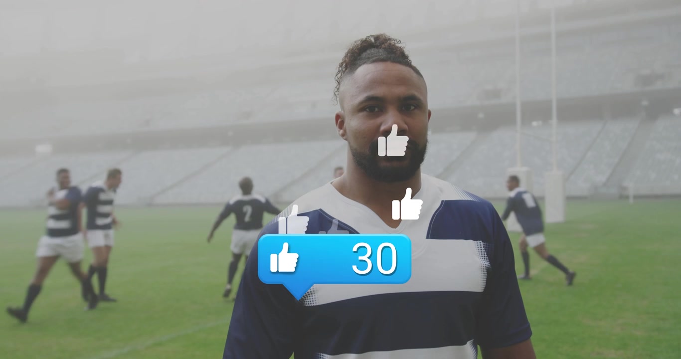 Rugby player standing blue bubble popping on chest thumbs rising counter reaching 60 for engagement