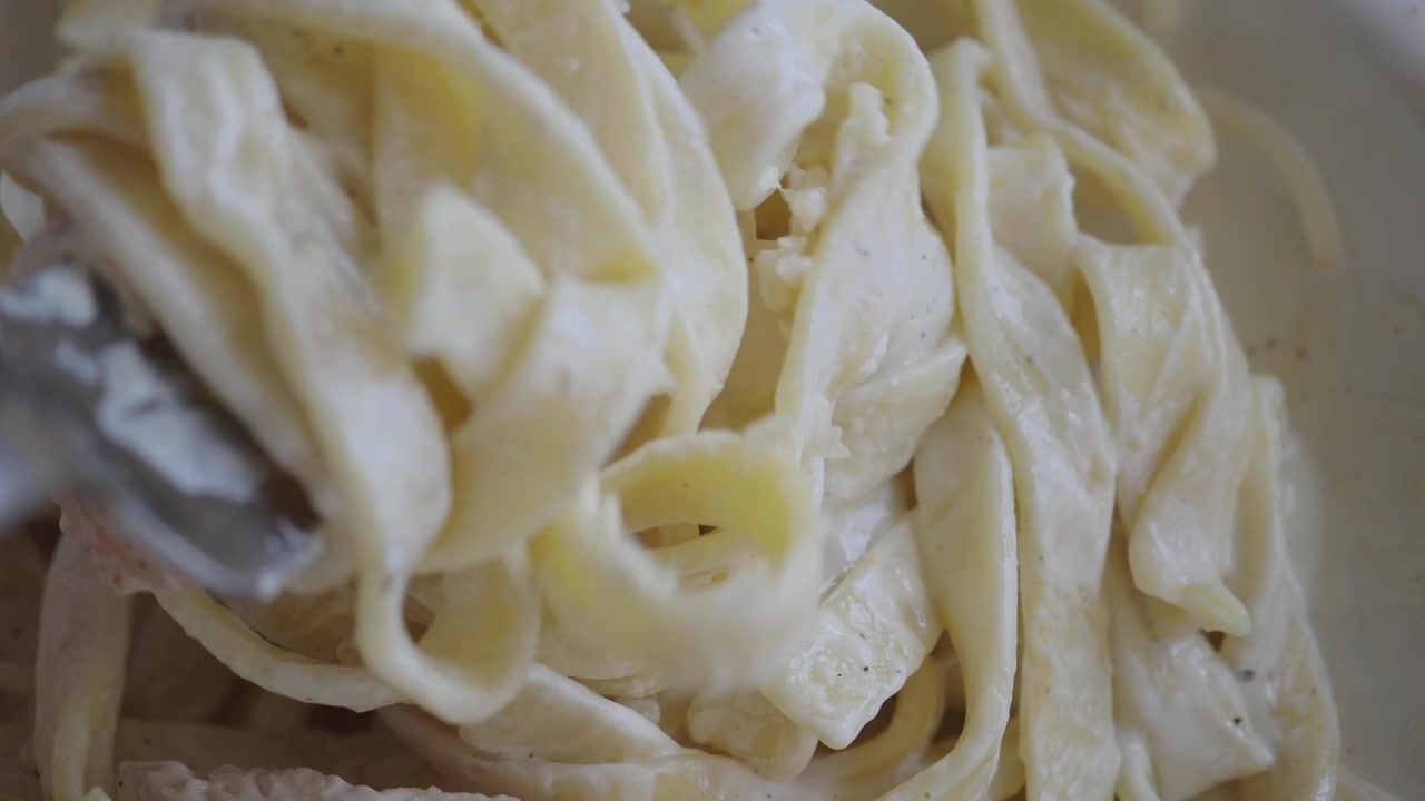 Fork Twirling Creamy Fettuccine Alfredo Pasta