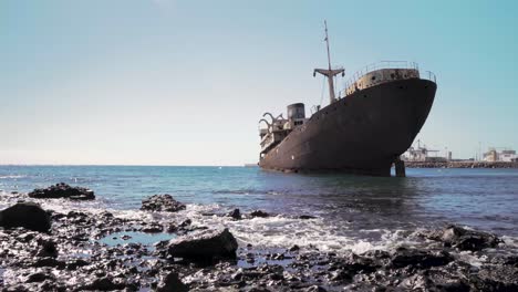 abandoned rusty shipwreck in the ocean