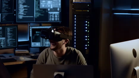 man experiencing immersive virtual reality in a tech environment