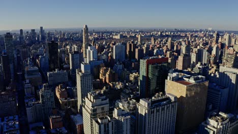 drone flying over manhattan against sky