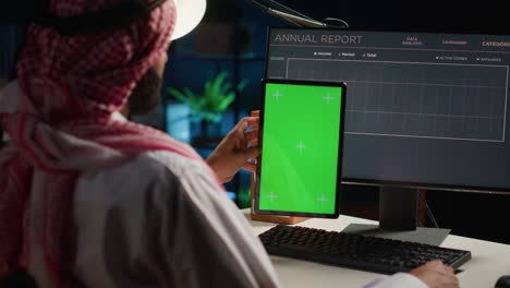 Worker-holds-isolated-screen-tablet