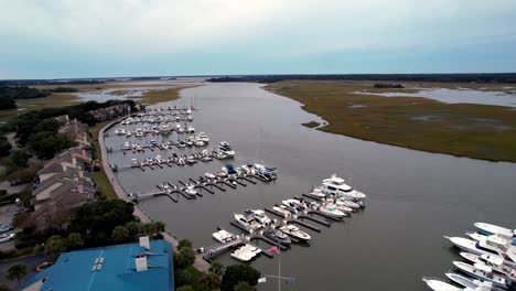 aerial-orbit-marina-along-bohicket-creek-near-kiawah-island-and-seabrook-island-sc,-south-carolina