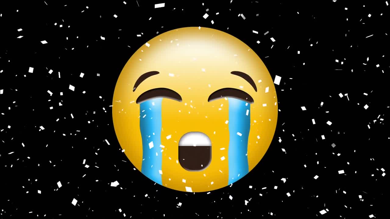 검은색 배경에 울고 있는 얼굴 이모지 위에 떨어지는 콘페티의 디지털 애니메이션
