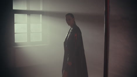 woman in black leather jacket in a studio
