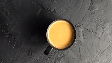 Brown-mug-with-coffee-and-milk