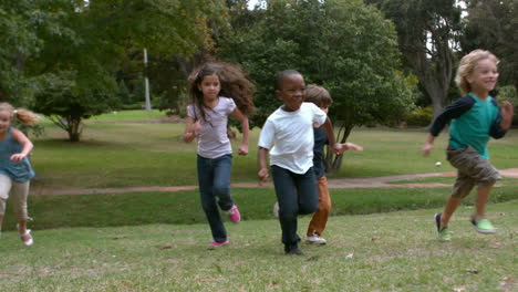 happy children running at the park