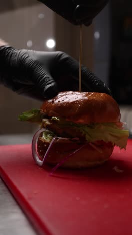 chef preparing a burger