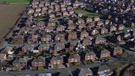 Típico-Pueblo-Suburbano-Residencial-Barrio-Inglés-Propiedad-Tejados-Vista-Aérea