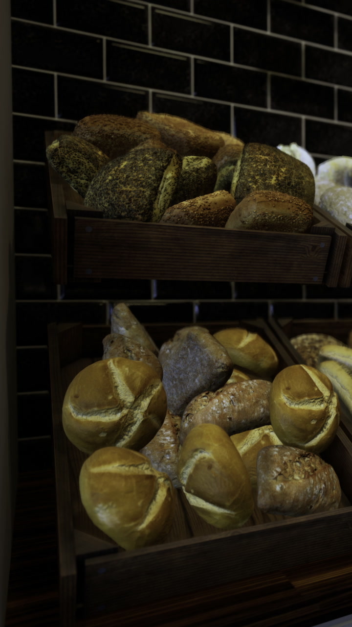 Breads on display in wooden racks at a bakery during the morning hours