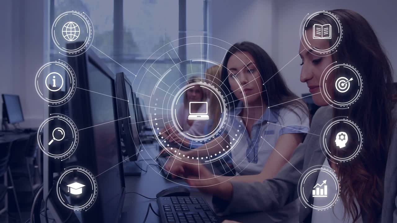 Right-hand woman pointing, middle woman typing, HUD overlay animating laptop icon in training lab