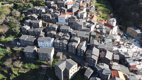 the beautiful village of piódão in portugal, with houses made of shale stone