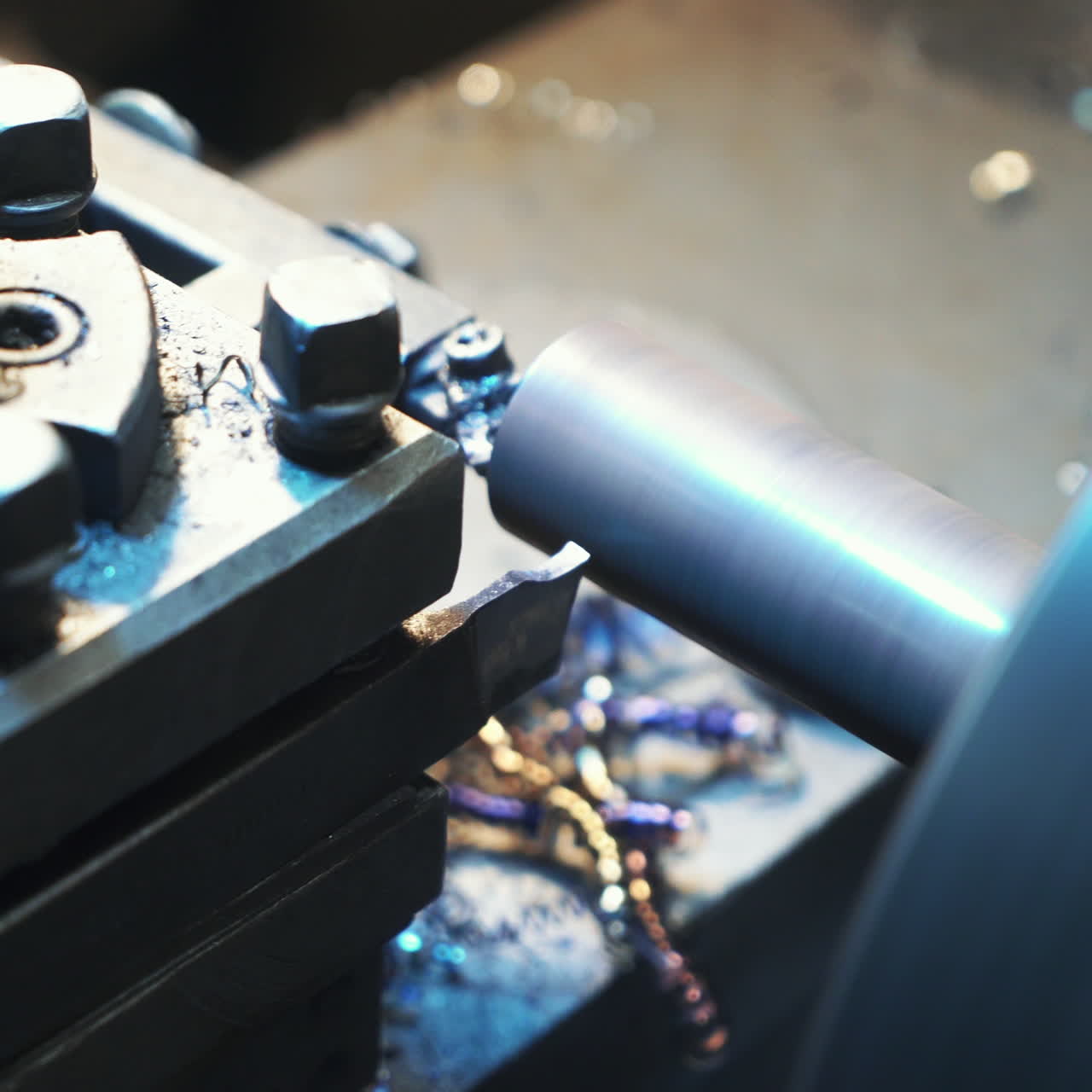 Industrial metal work machining process by cutting tool on CNC lathe. Metalworking equipment.