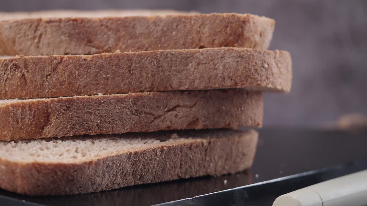 A stack of whole wheat bread slices