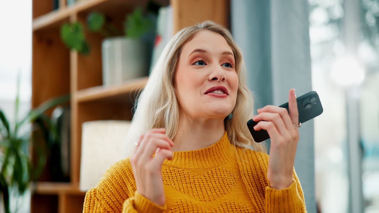 Woman talking on the phone using speakerphone