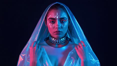 a stunning fusion of light and style: this artistic portrait features a model adorned in vibrant makeup and ethereal fabric, enhancing the mystique of modern aesthetics