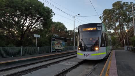 tram approaching and stopping at melbourne station