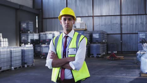 Animation-of-financial-data-processing-over-biracial-man-working-in-warehouse