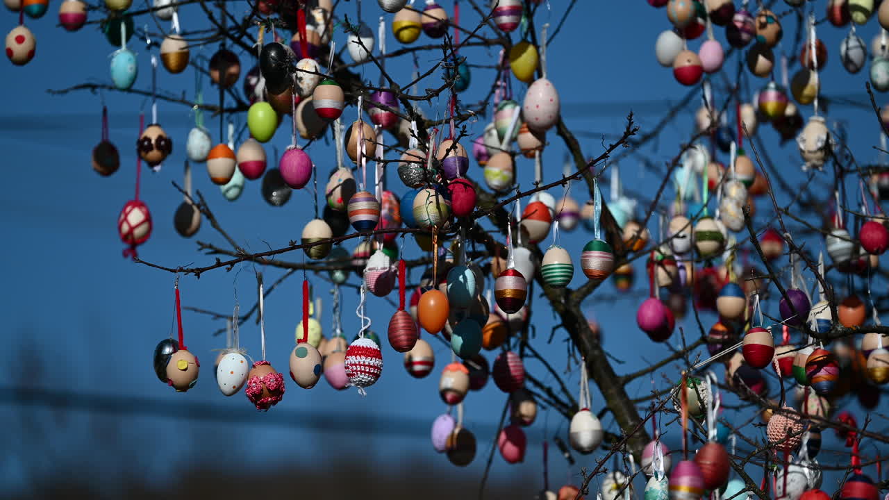 Close-up of Easter egg tree with colorful decorations