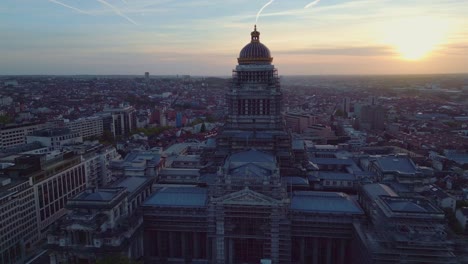 aerial view of brussels with the justice palace in front during the sunset