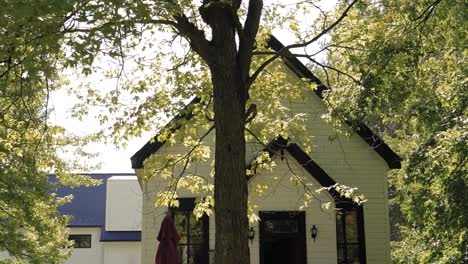 Heritage-school-house-with-a-beautiful-lantern-out-front-and-surrounded-by-woods-in-Ottawa,-Canada-at-the-Strathmere-Resort