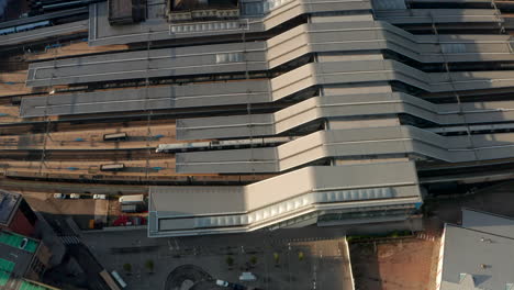 pan up aerial shot from reading train station to reveal town centre